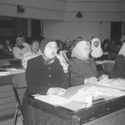 Women participating in a meeting