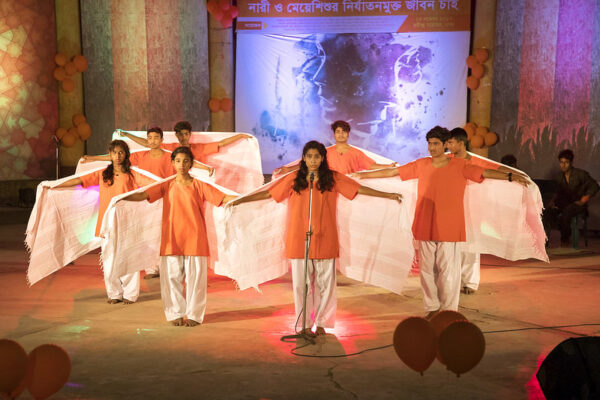 A musical performance on stage in Bangladesh.