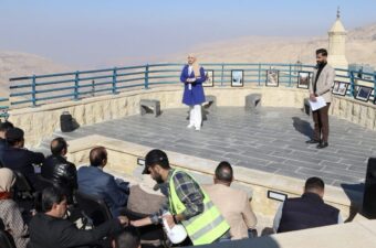 People visiting a historical site in Jordan.