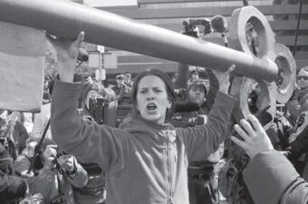 Powerful symbols, such as a magnifying glass sent with every press release and a giant key to “unlock government secrets,” were used to highlight the rationale behind the Search and Seizure Operation. (Ottawa, April 2, 2001; credit Benoït Aquin.)