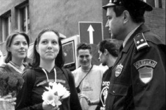 Optor students smiling face to face with the police.