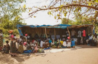 Group of community members gathered in Northern Uganda