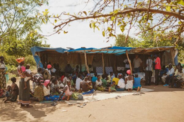 Group of community members gathered in Northern Uganda